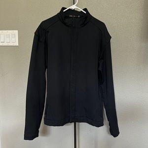 Tiger Woods warm golf jacket. Black size Large
